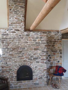 Masonry Heater stone woodstove.