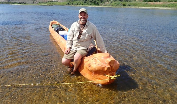 Tom Elpel with Belladonna Beaver the dugout canoe.