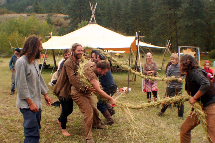 Playing with a grass rope.