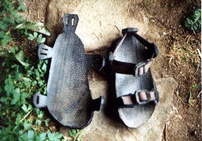 Tire sandal cut out and with straps.