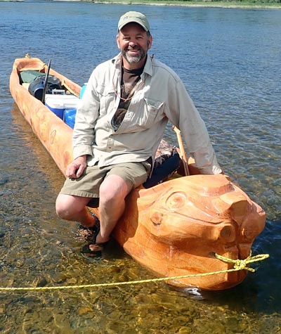 Tom Elpel with Belladonna Beaver the dugout canoe.